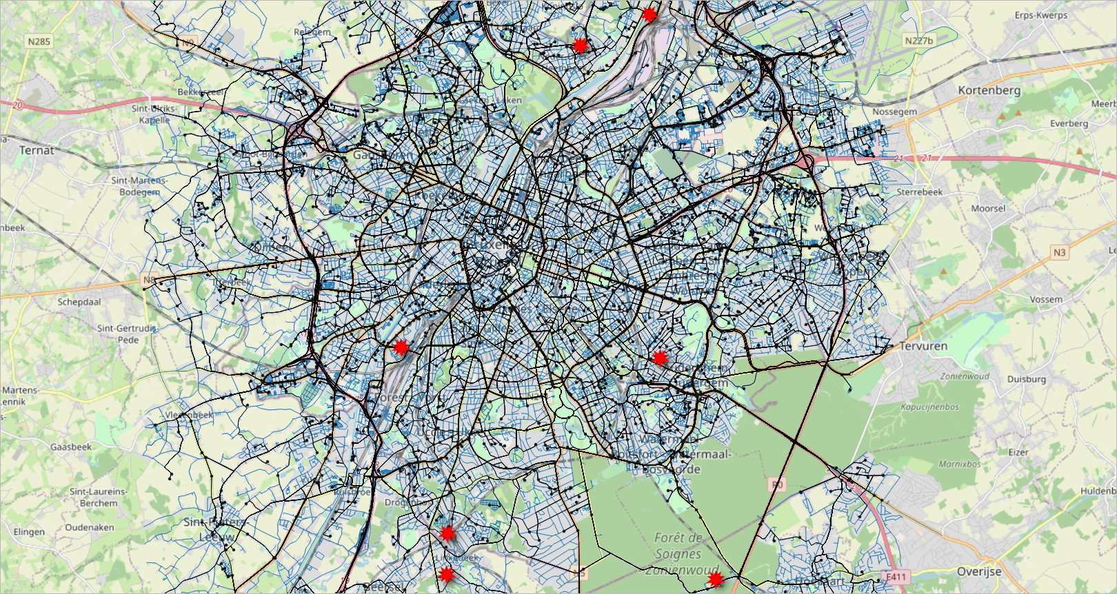 Visualization of the data generated for the deliveries scenario. The road network is shown with blue lines, the warehouses are shown with a red star, the routes taken by the deliveries are shown with black lines, and the location of the customers with black points.